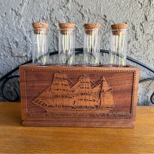 walnut wooden bud vase holder with four glass tubes
